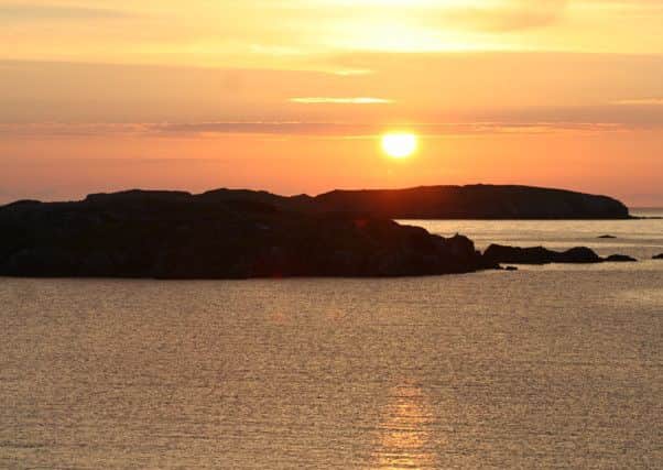 The evening sun over The Isle of Lewis. Photo: John Groom