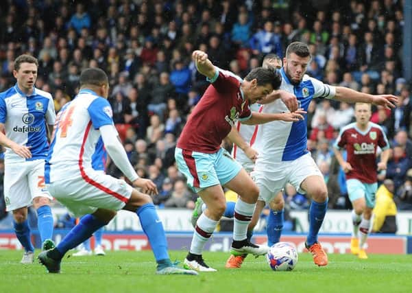 The first penalty shout at Ewood, as Grant Hanley impedes Joey Barton