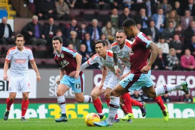 Andre Gray strokes home his penalty