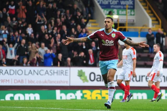 Andre Gray celebrates after scoring from the spot