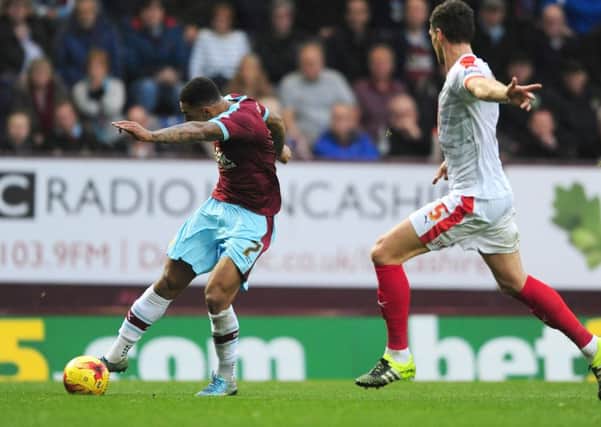 Andre Gray fires home his second goal against Huddersfield Town on Saturday