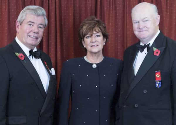 Sir David and Lady Trippier with Peter Lowndes. (s)