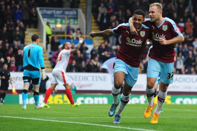 Andre Gray celebrates his opener with Scott Arfield