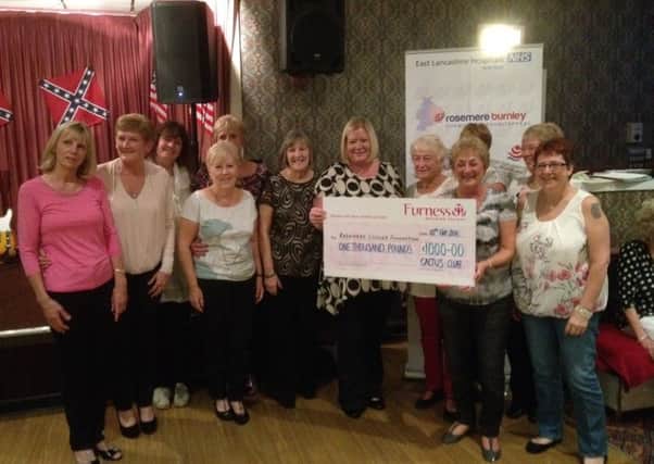 The Cactus Line Dancing Club donation to the charity Rosemere Cancer. (S)