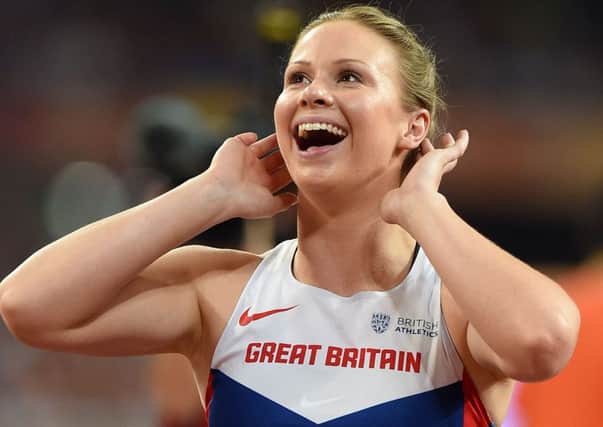 Great Britain's Sophie Hitchon smiles after her throw in the Women's Hammer Throw final during day six of the IAAF World Championships at the Beijing National Stadium, China. PRESS ASSOCIATION Photo. Picture date: Thursday August 27, 2015. See PA story ATHLETICS World. Photo credit should read: Martin Rickett/PA Wire. RESTRICTIONS: Editorial use only. No transmission of sound or moving images and no video simulation. Call 44 (0)1158 447447 for further information