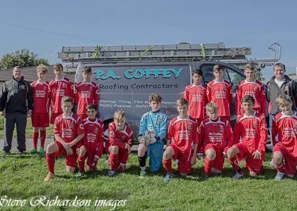 Paul Coffey of P.A. Coffey Roofing Contractors with Colne Juniors Under 14s.