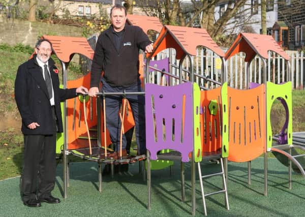 Chairman of Fence Parish Council, Coun. Brian Newman with Paul Shaw at the newly refurbished play park.