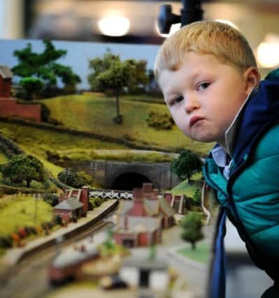 Pendle Forest Model Railway Society's annual exhibition: Jack Wintersgill aged 4 from Padiham, waits patiently for the next train. Picture: Paul Heyes.