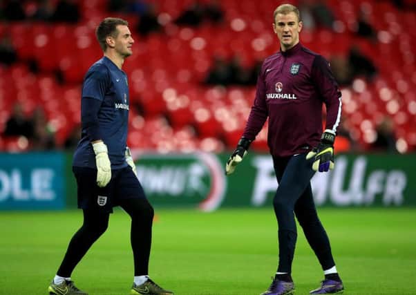 England goalkeepers Tom Heaton (left) and Joe Hart before the international friendly match at Wembley Stadium, London. PRESS ASSOCIATION Photo. Picture date: Tuesday November 17, 2015. See PA story SOCCER England. Photo credit should read: Nick Potts/PA Wire. RESTRICTIONS: Use subject to FA restrictions. Editorial use only. Commercial use only with prior written consent of the FA. No editing except cropping. Call +44 (0)1158 447447 or see paphotos.com/info for full restrictions and further information.