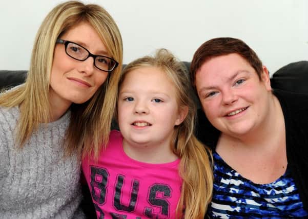 Sarah Monk, right, from Sough, with daughter Chloe Jackson aged 9 and cousin Kelly Marshall. Sarah has terminal cancer and the family are hoping to raise money for a last dream holiday to Disneyland in Florida. Picture by Paul Heyes