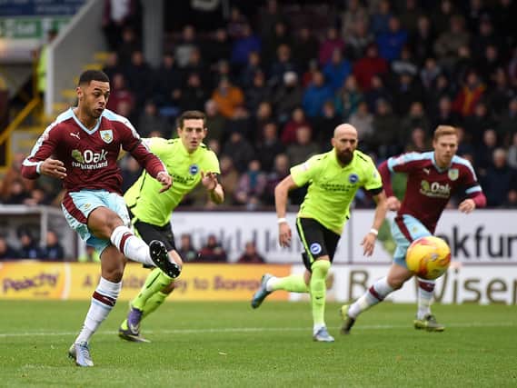 Andre Gray equalises from the spot