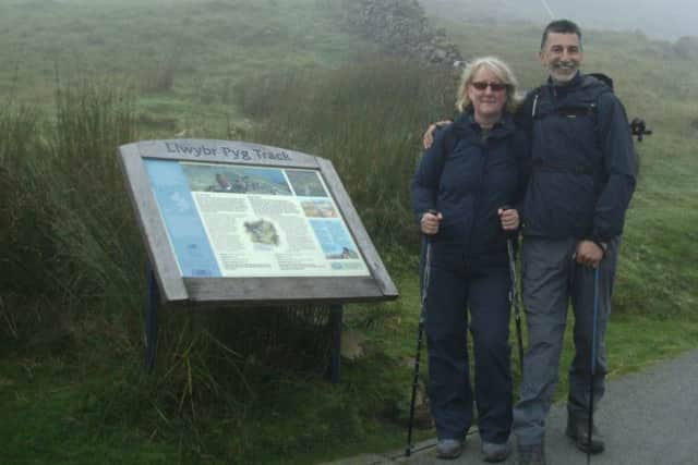 Tracy Geldart and fiance Mark Gornall climbing Mount Snowdon before an accident left her paralysed (s)