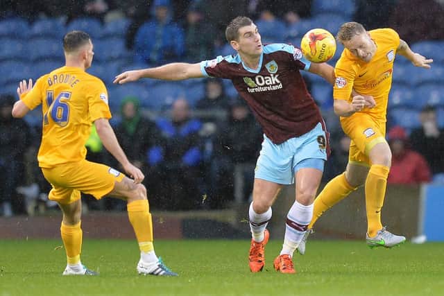 Sam Vokes tries to win the ball.