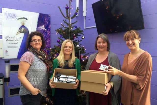 Carers Link Lancashire with a donation of 1500 chocolate treats.