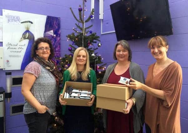 Carers Link Lancashire with a donation of 1500 chocolate treats.