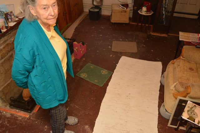 Marion Sycamore's carpet was ruined in the floods
