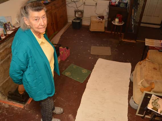 Marion Sycamore's carpet was ruined in the floods
