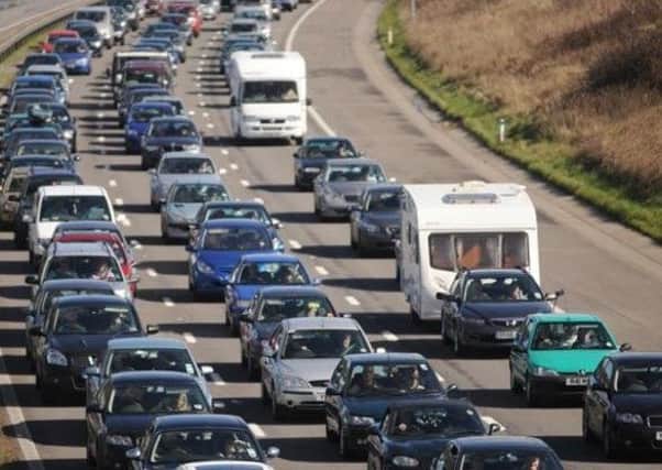 Gridlock: Traffic snarl-ups are certain as travellers start driving home for Christmas