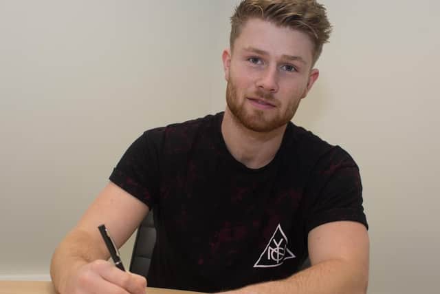 Bradley Jackson signs his new contract