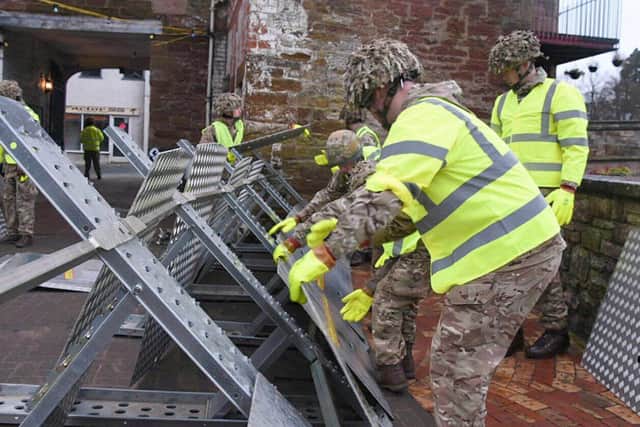 FLOOD LATEST: Army called in to help flooding victims