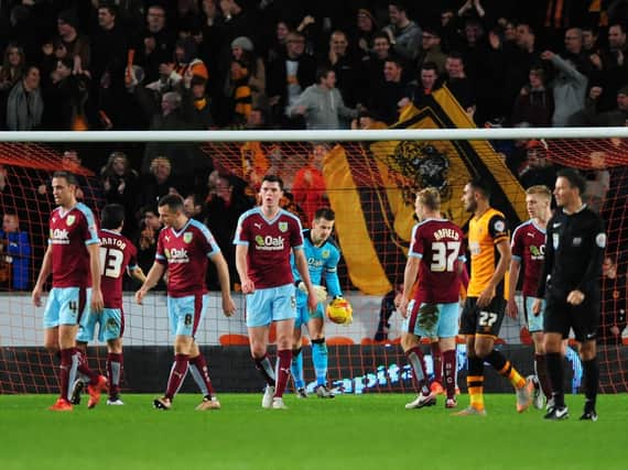 Burnley players react after Hull City's Abel Hernandez scored his sides second goal