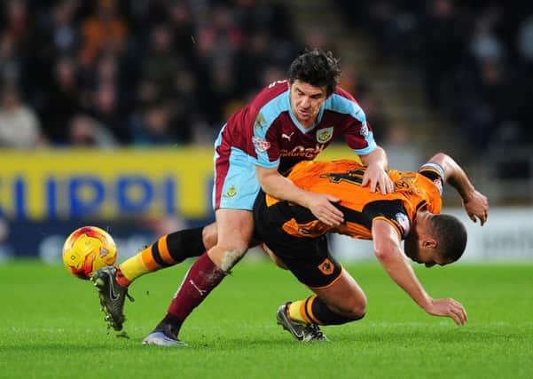 Joey Barton gets to grips with Jake Livermore