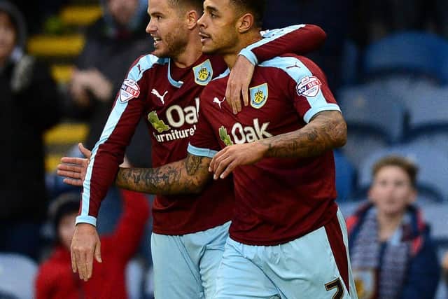 Andre Gray celebrates with Michael Kightly