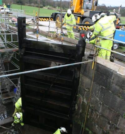 One of the lock doors is replaced in the Barrowford Locks on the Leeds Liverpool Canal.