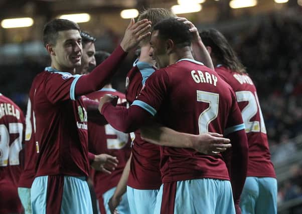 Burnley players help Andre Gray celebrate his goal