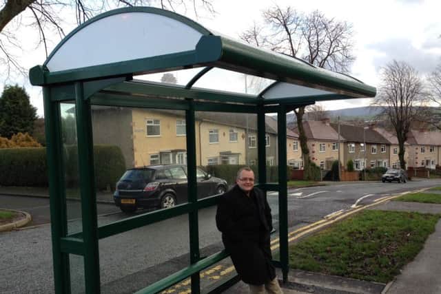 Coun. Joe Cooney at the bus shelter in Ruskin Avenue in Colne. (S)
