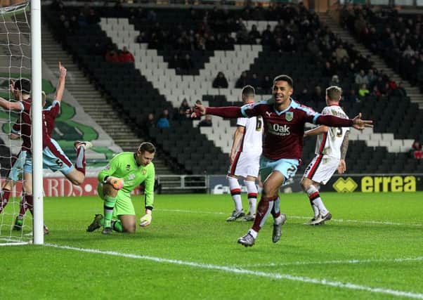 Andre Gray celebrates his goal against MK Dons