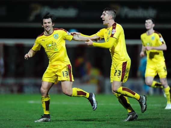 Joey Barton and Stephen Ward celebrate the second goal