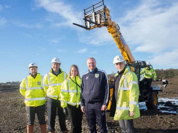 Pictured as work commences at the Barnfield Training Centre are Burnley FC manager Sean Dyche and some of the workmen from Barnfield Construction Limited