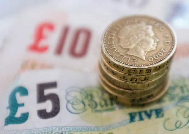 Average wages have dropped in North West since 2008. Photo: Dominic Lipinski/PA Wire
