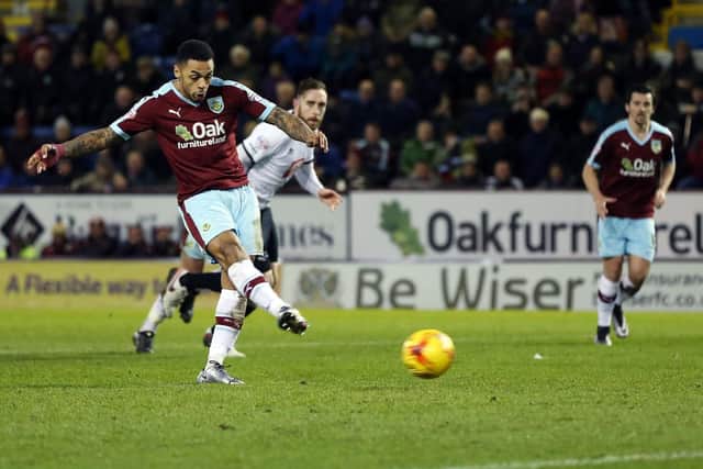Andre Gray strokes home from the spot