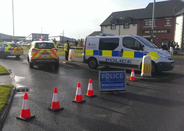 Police block Ordnance Road in Buckshaw Village, near Chorley, after a susicious package was found at Cellmark Forensics