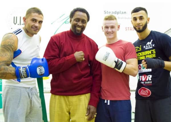 Tommy Hearns poses with Ben Chapman (left), Alex McCloy and Qasim Niaz at Maree Boxing.