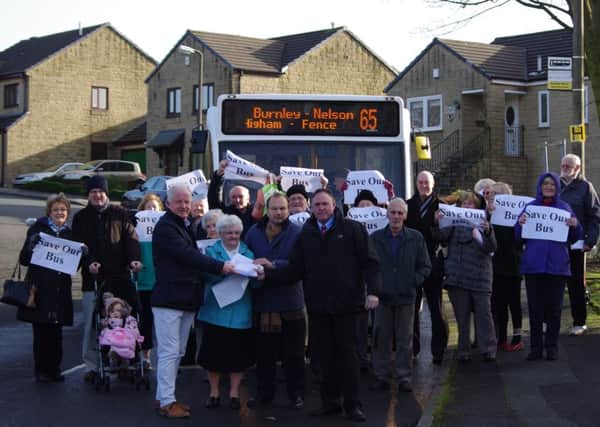 Residents protest against the planned axe of the number 65 bus service which serves the Clifton Farm area of Burnley (s)