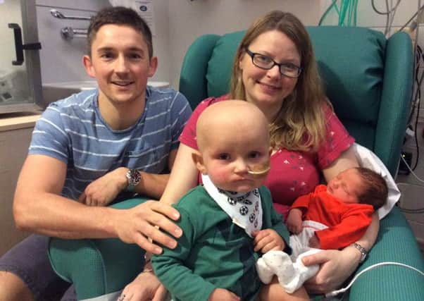 Dylan Brown, who is battling leukaemia with his parents Ben and Lisa and baby sister Florence (s)