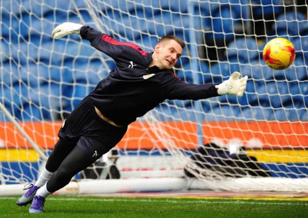 Goalkeeper Tom Heaton warming up prior to victory over Championship leaders Hull City at Turf Moor