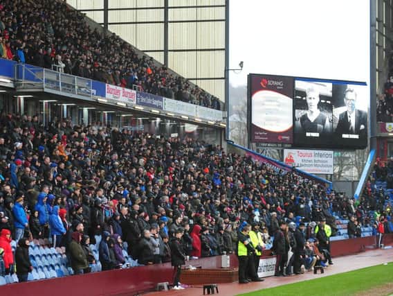 Turf Moor stood silent as one in memory of Ray Pointer and Frank Teasdale