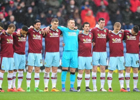 Burnley players observe a minutes silence in memory of Ray Pointer and Frank Teasdale

Photographer Chris Vaughan/CameraSport

Football - The Football League Sky Bet Championship - Burnley v Hull City - Saturday 6th February 2016 - Turf Moor - Burnley 

Â© CameraSport - 43 Linden Ave. Countesthorpe. Leicester. England. LE8 5PG - Tel: +44 (0) 116 277 4147 - admin@camerasport.com - www.camerasport.com
