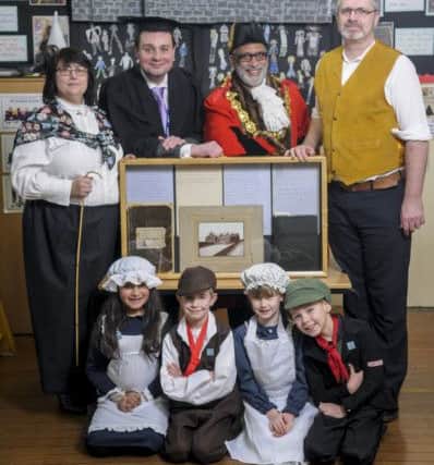 Christ Church Primary School in Colne is celebrating its 175th anniversary by dressing up in Victorian clothing.  Pictured are teacher Stephanie Tilsley, headteacher Andrew Peers, mayor of Pendle Nawaz Ahmed, and David Tilsley from Lancashire Archives with pupils Yasmine Mirfield, Morgan Ainsworth, Alice Tilsley and Joshua Wright.