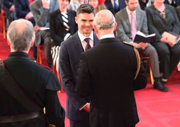 James Anderson is made an OBE (Officer of the Order of the British Empire) by the Prince of Wales during an Investiture ceremony at Buckingham Palace, London.