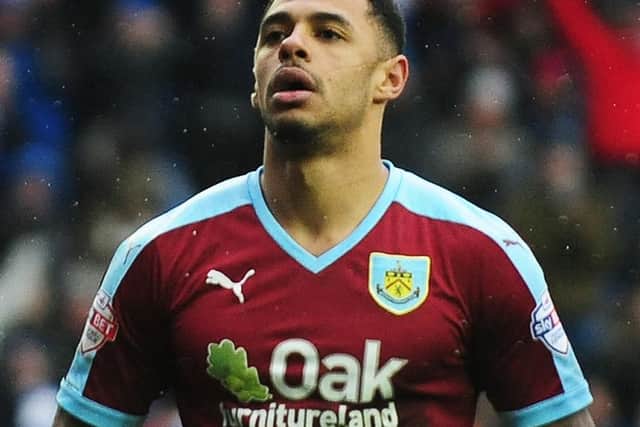 Andre Gray is dejected following his penalty miss