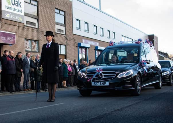 Frank Teasdale's hearse stopped outside Turf Moor on the way to Burnley Crematorium