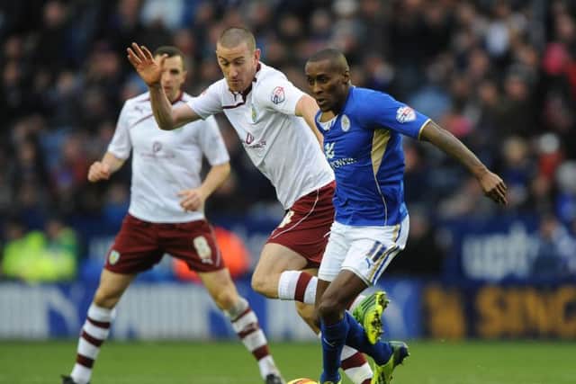 Lloyd Dyer takes on David Jones during his time with Leicester City