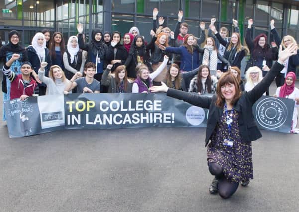 Principal of Nelson and Colne College Amanda Melton celebrates success with students. (S)