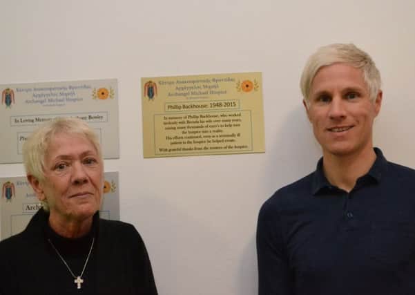Brenda Backhouse and son John unveil the plaque in Paphos in memory of Phillip Backhouse.