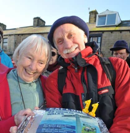 Photo Neil Cross
Edith Sheldrick and Jim Maden of  Barnoldswick Let's Walk and Talk Group celebrates its 11th anniversary
